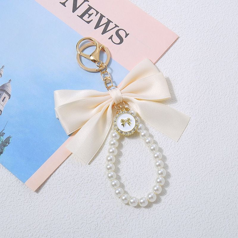 Bow Pearl Charm